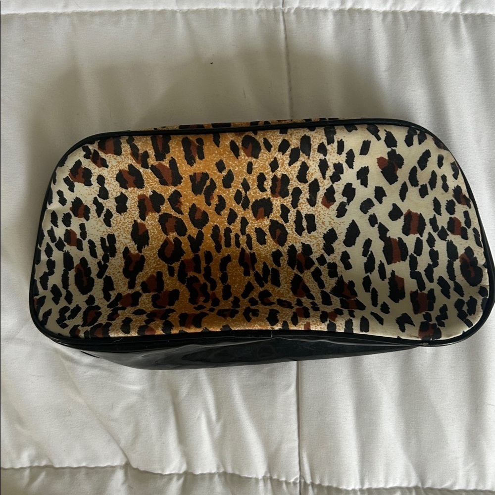 Lancôme animal print cosmetic bag zip black brown 10” x 5”